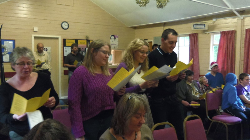 Members of Harvest Field worshipping together